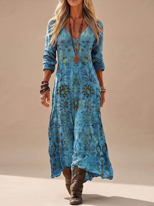 Dames blauwe maxi jurk met bloemenprint en lange mouwen