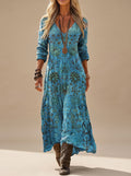 Dames blauwe maxi jurk met bloemenprint en lange mouwen