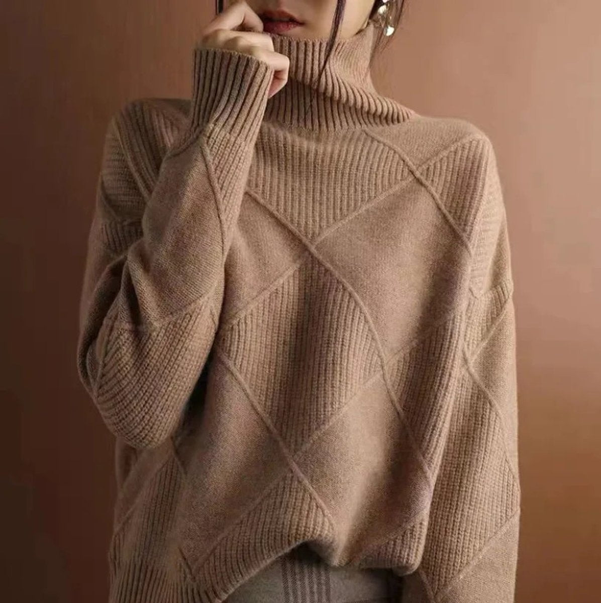 Dames gebreide coltrui met ruitmotief en oversized pasvorm