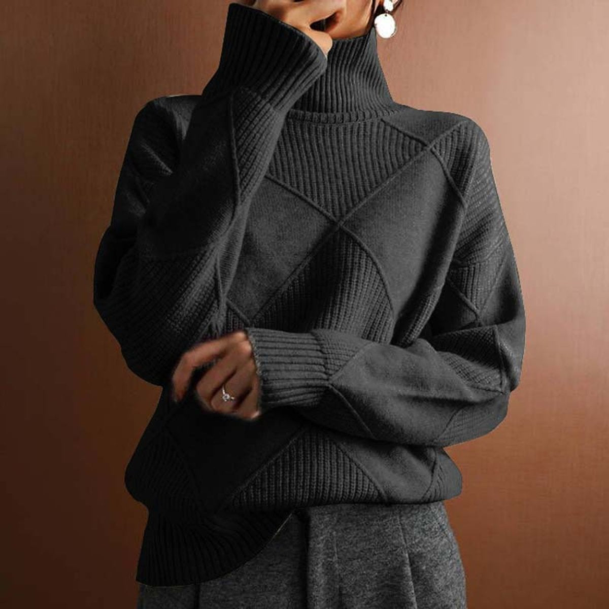 Dames gebreide coltrui met ruitmotief en oversized pasvorm