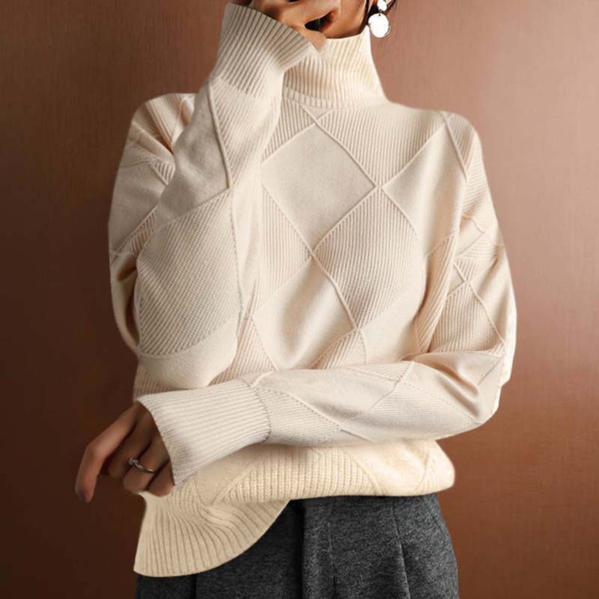 Dames gebreide coltrui met ruitmotief en oversized pasvorm
