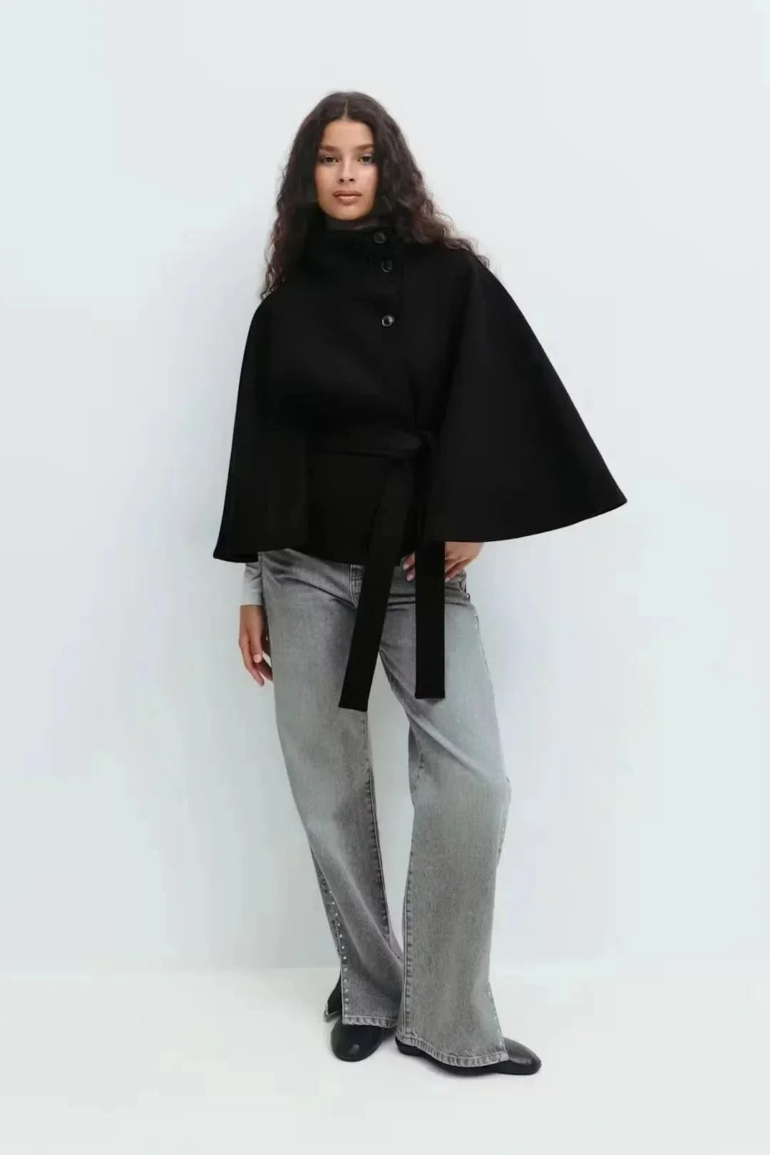 Dames gedrapeerde cape met getailleerde taille