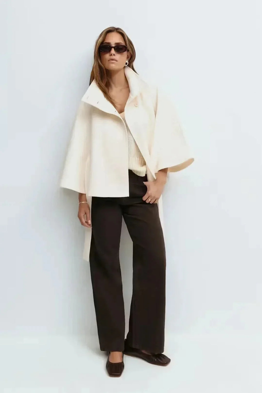 Dames gedrapeerde cape met getailleerde taille