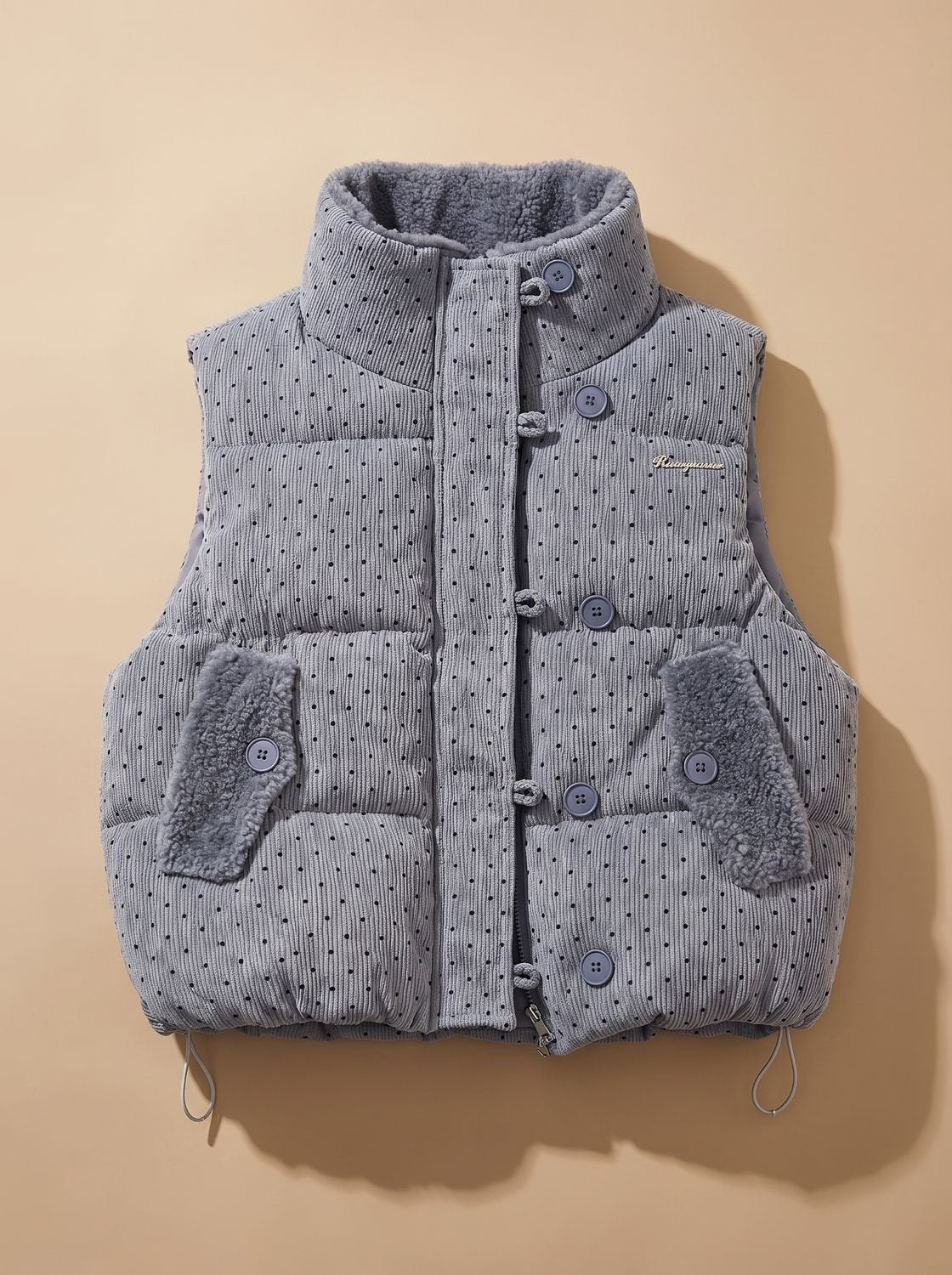 Dames gewatteerde bodywarmer met teddykraag en blinde rits