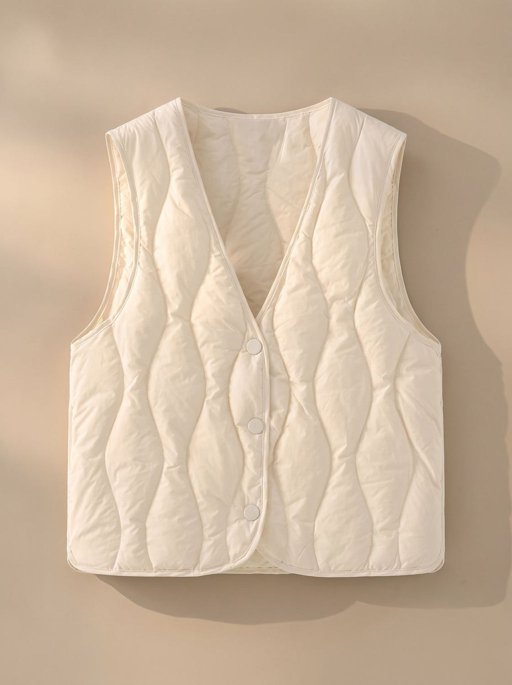 Dames gewatteerde bodywarmer met V-hals en drukknopen