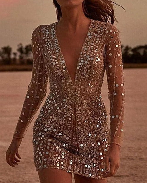 Dames glitterjurk met V-hals en transparante mouwen