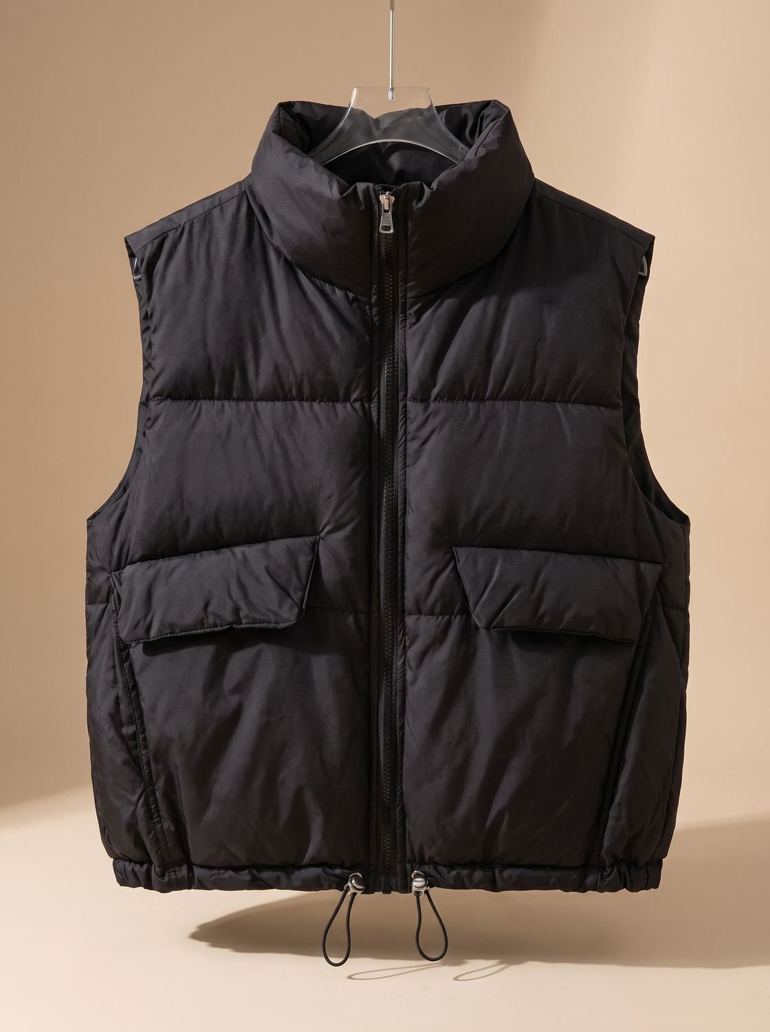 Dames korte gewatteerde bodywarmer met trekkoord in de zoom