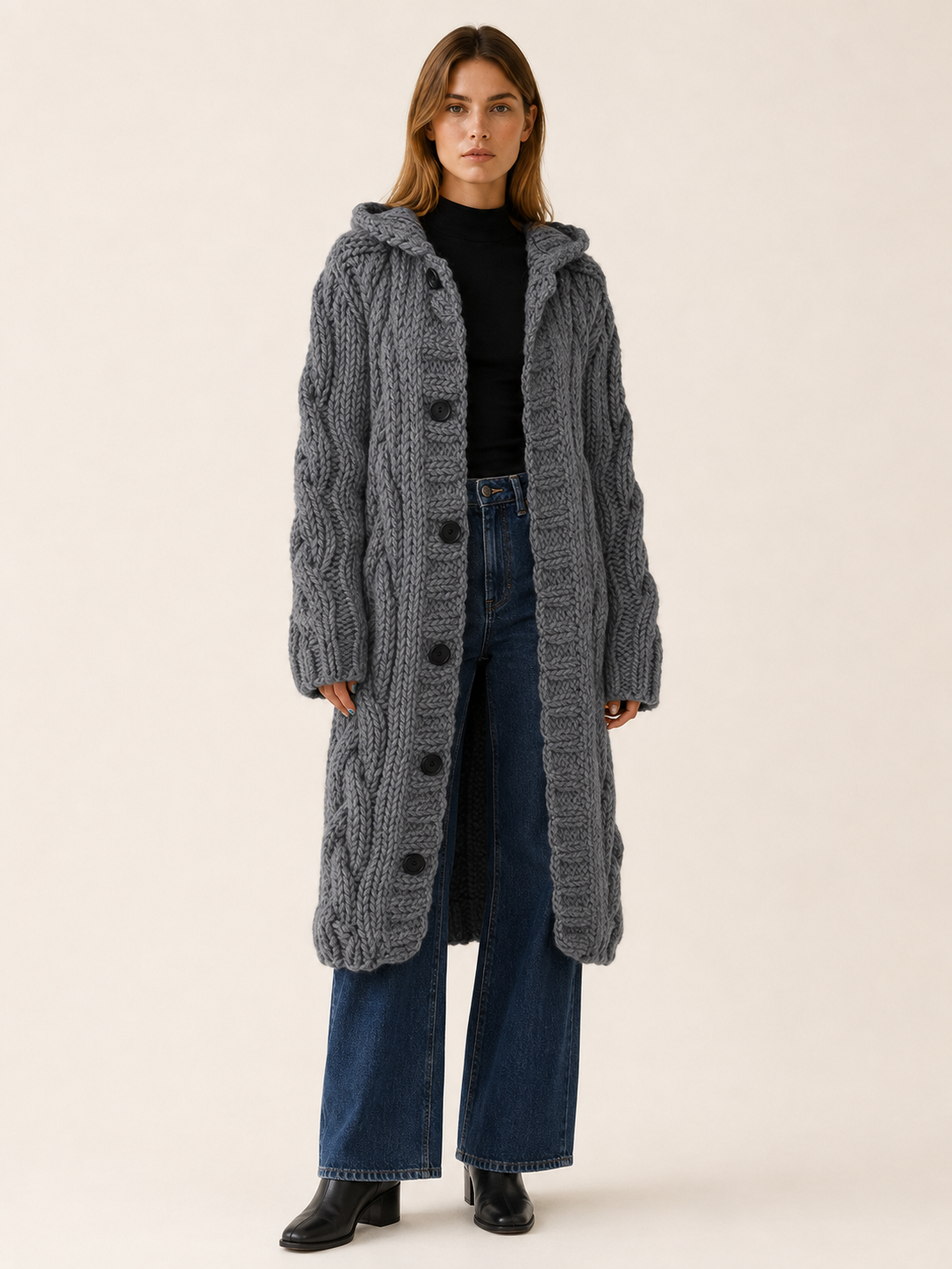 Dames lang gebreid vest met capuchon en knoopsluiting