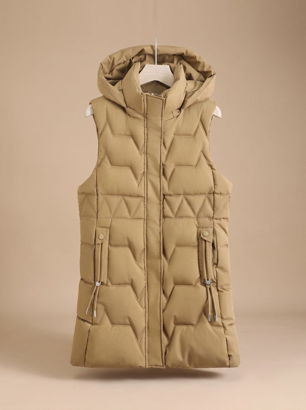 Dames lange gewatteerde bodywarmer met capuchon