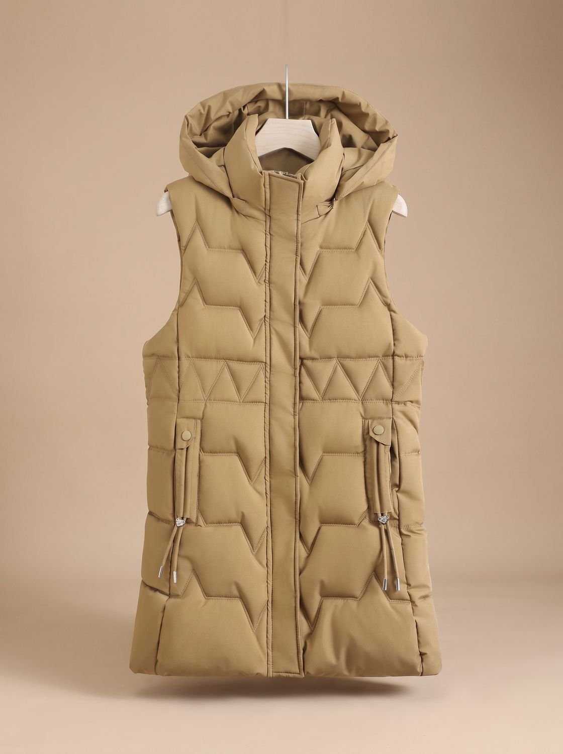 Dames lange gewatteerde bodywarmer met capuchon