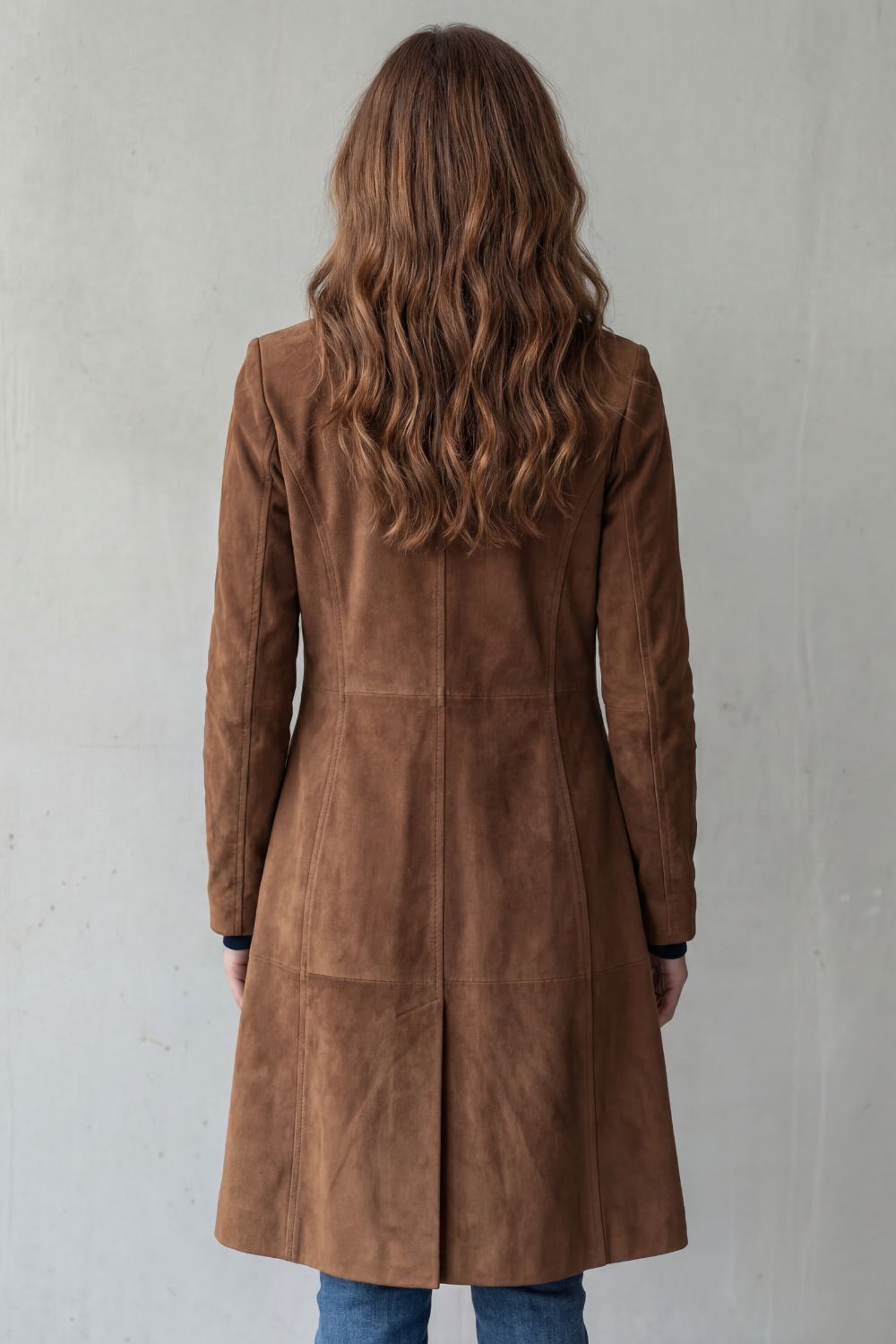 Dames lange winterjas met knoopsluiting en steekzakken