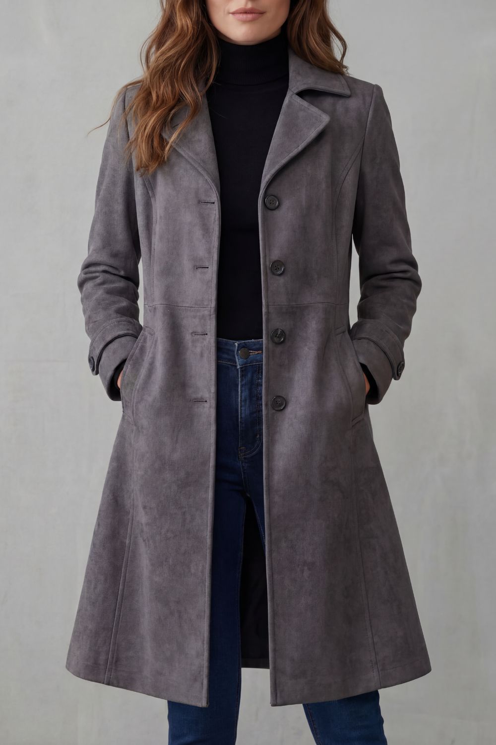 Dames lange winterjas met knoopsluiting en steekzakken