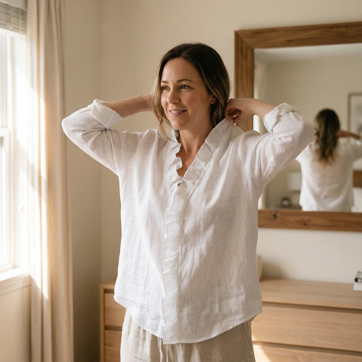 Dames losvallende blouse met ruches en lange mouwen