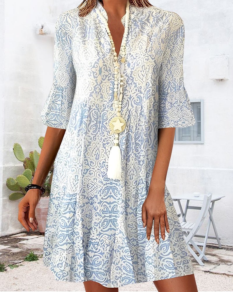 Dames midi jurk met paisleyprint en driekwartmouwen