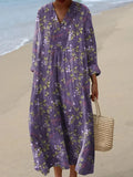 Dames paarse midi jurk met bloemenprint en lange mouwen