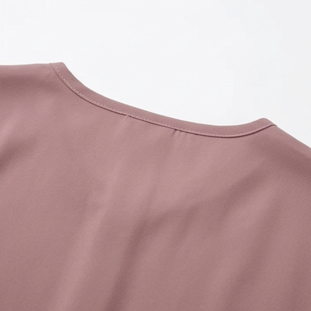 Dames top met geknoopte voorkant en kapmouwtjes