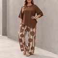 Dames tweedelige set met asymmetrische top en wijde broek