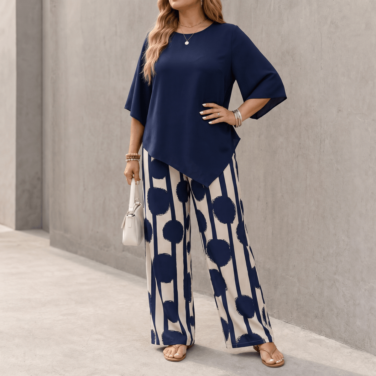 Dames tweedelige set met asymmetrische top en wijde broek